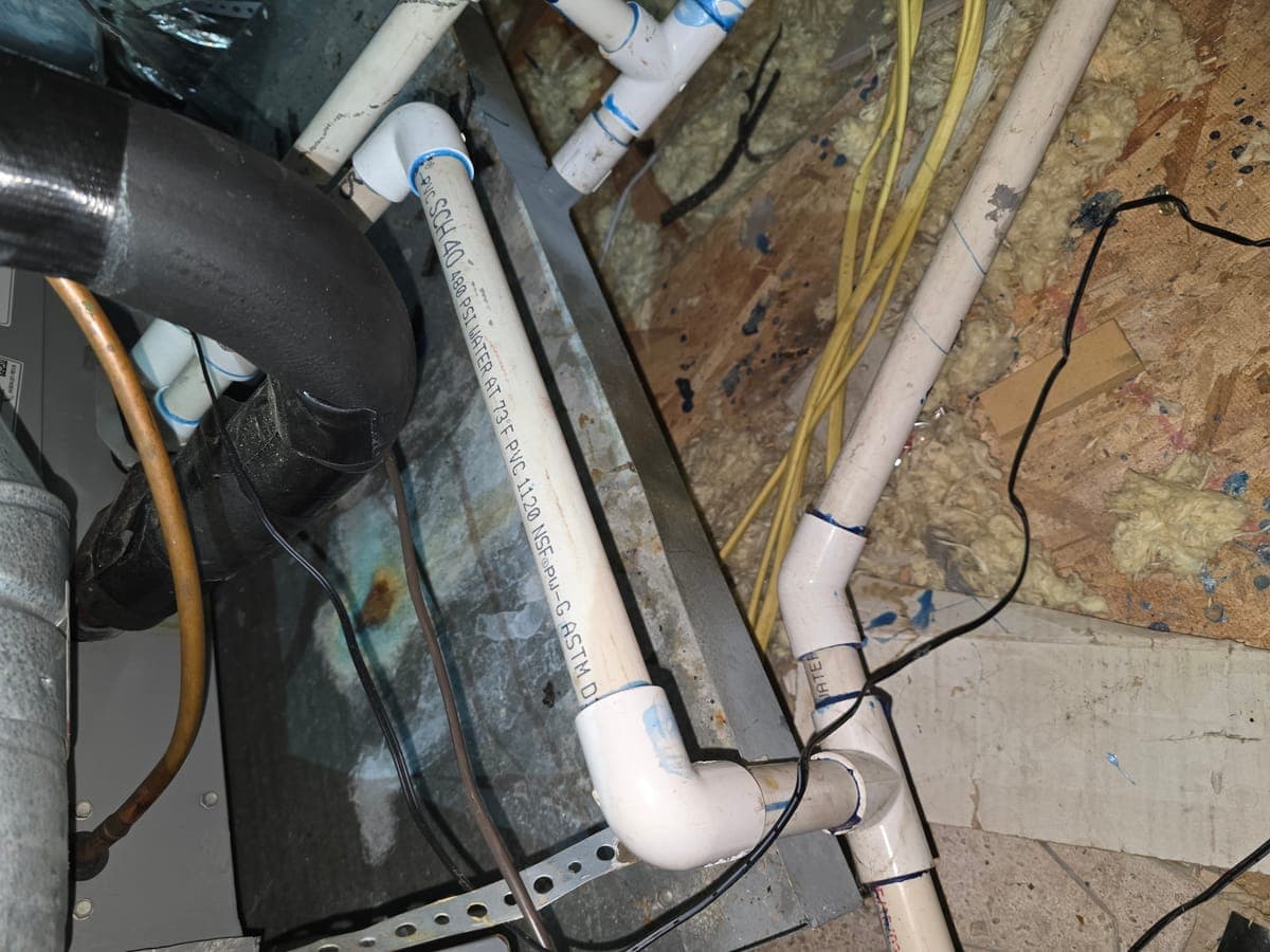 Condensate drain line installed in attic near furnace in Coppell TX